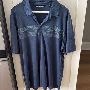 Travis Mathew Navy Polo with Teal Stripe Accent